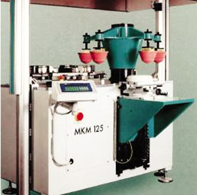 Рис. 7. Многокрасочная машина для тампонной печати карусельного 	построения (MKM 125, Morlock)
