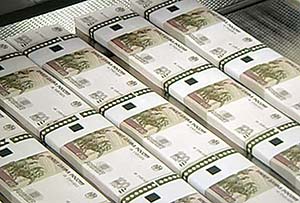 Теперь уже «старая» банкнота номиналом 100 рублей с изображением Большого театра — от печатного листа до упаковки