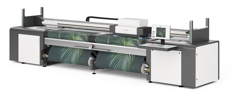 Принтер SwissQprint Karibu позволяет печатать одновременно 
на двух рулонах